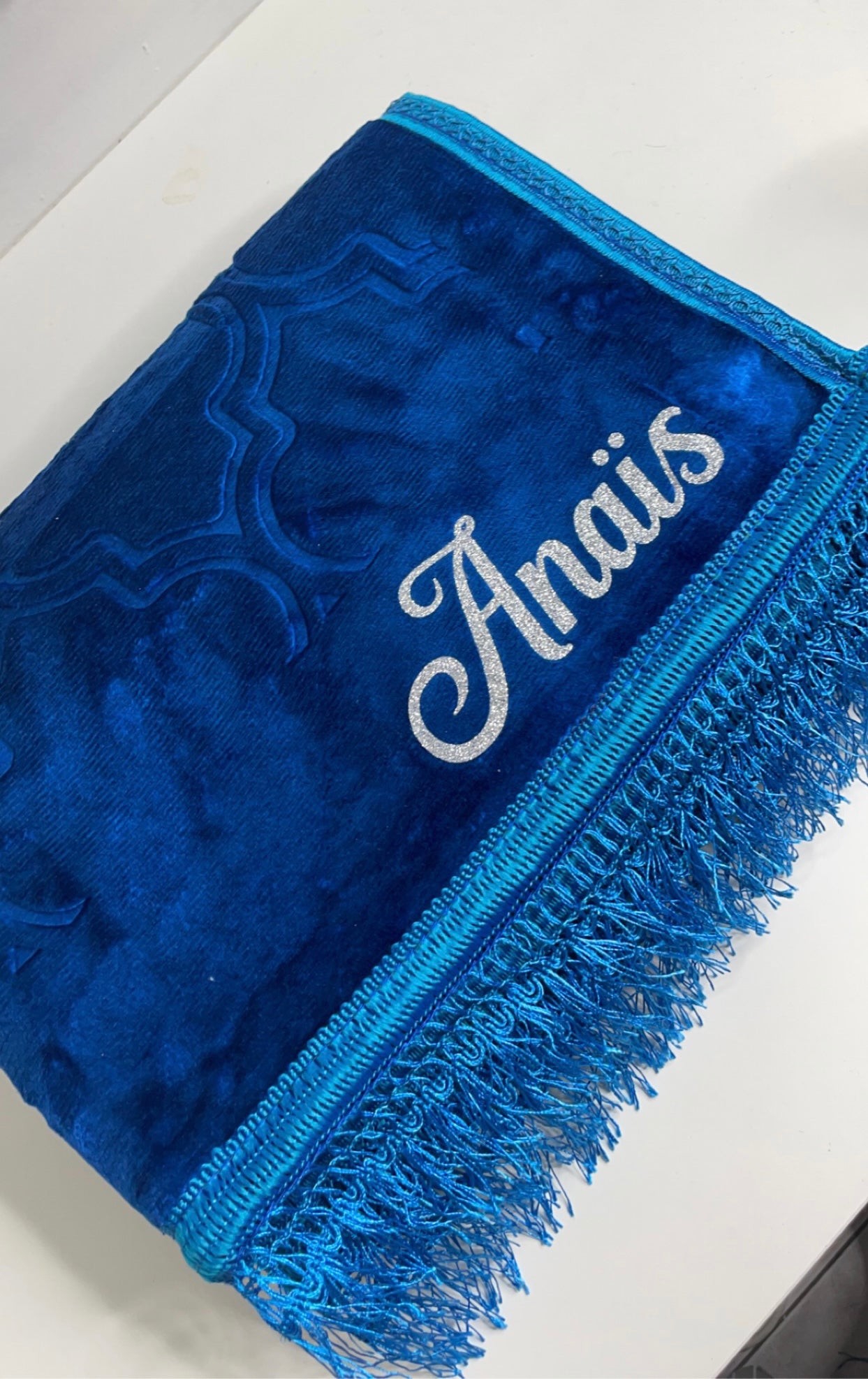 Tapis turquoise personnalisé